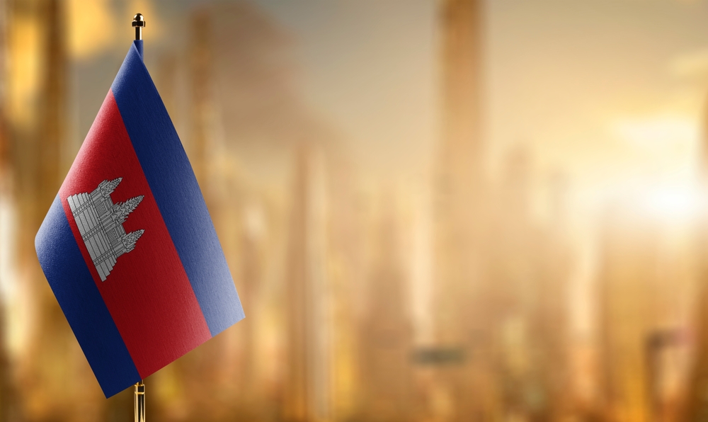 A,small,cambodia,flag,on,an,abstract,blurry,background.